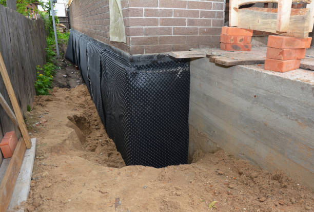 Happy homeowners after waterproofing job in Lucasville